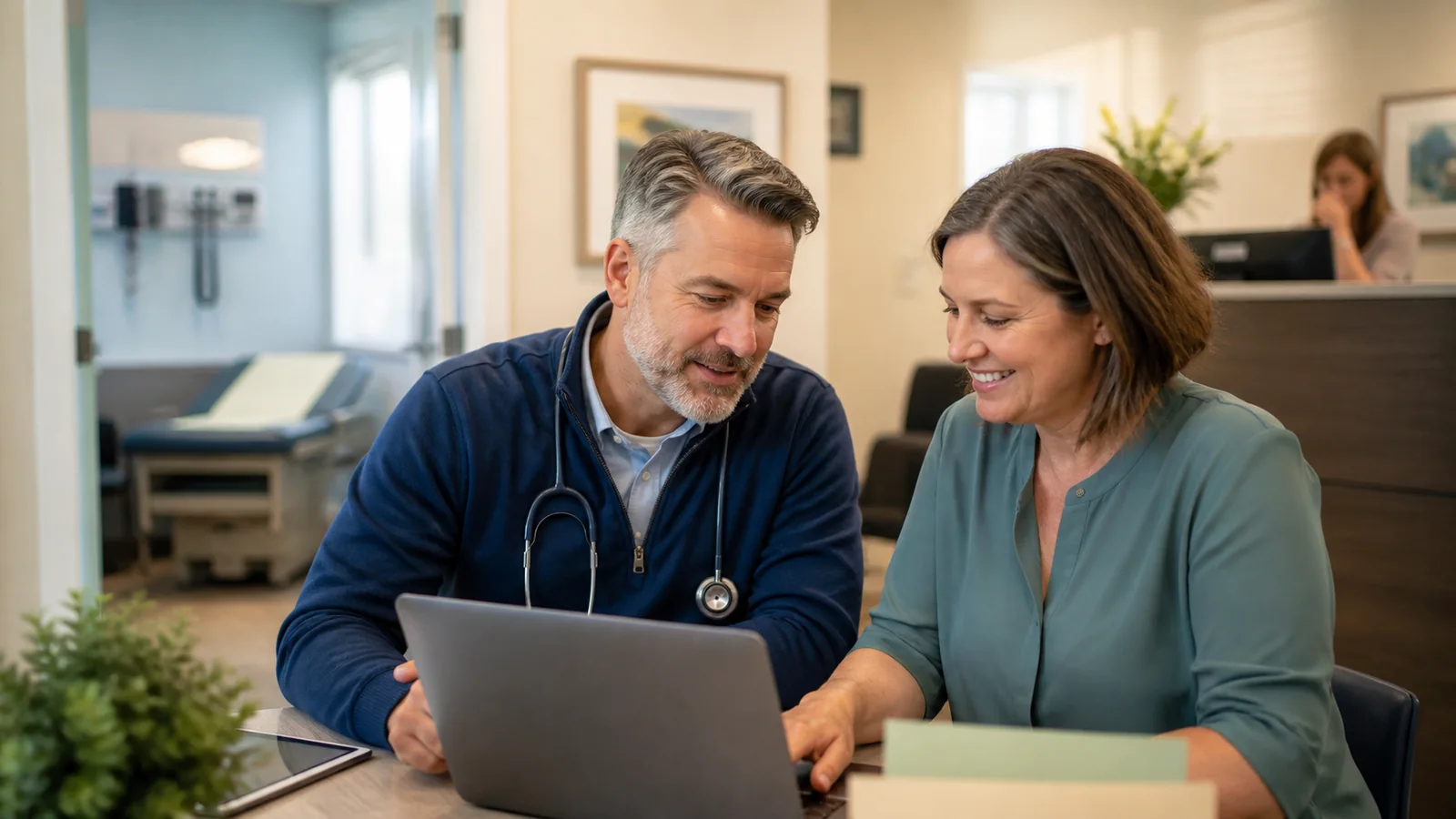 A physician practice owner and office manager reviewing a technology roadmap