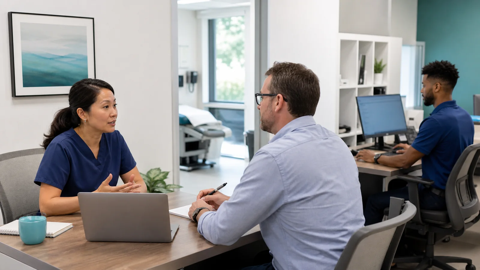 A clinic leader participating in a readiness interview while technical observations are reviewed